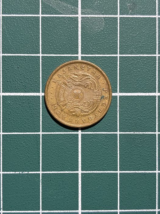 Монета номиналом 2тиын