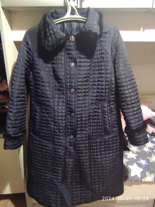 Тёплое зимнее пальто.