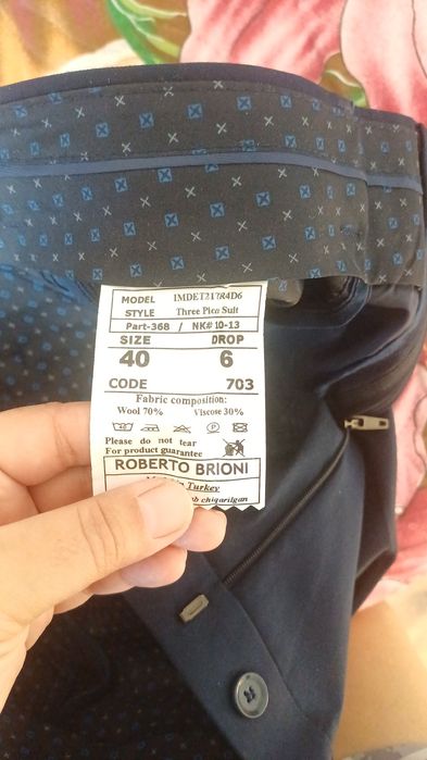 Продам синий костюм мужской