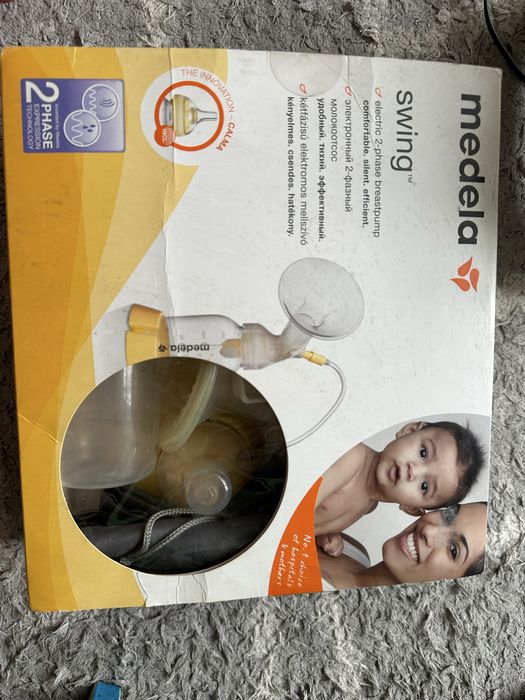 Электронный молокоотсос Medela