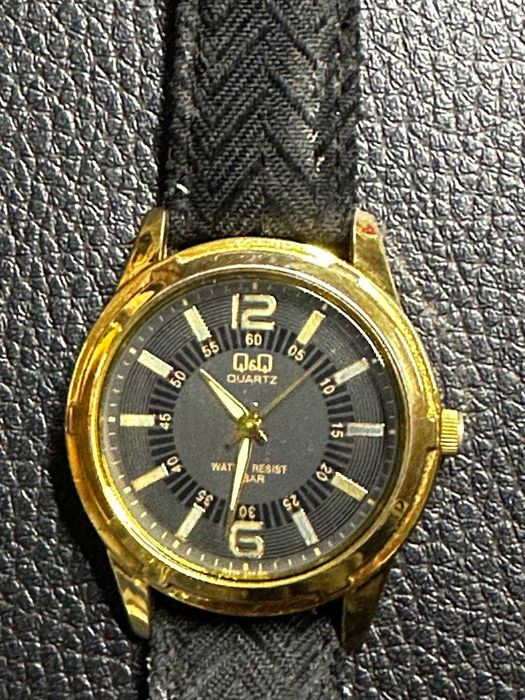 Наручные часы фирмы Q&Q