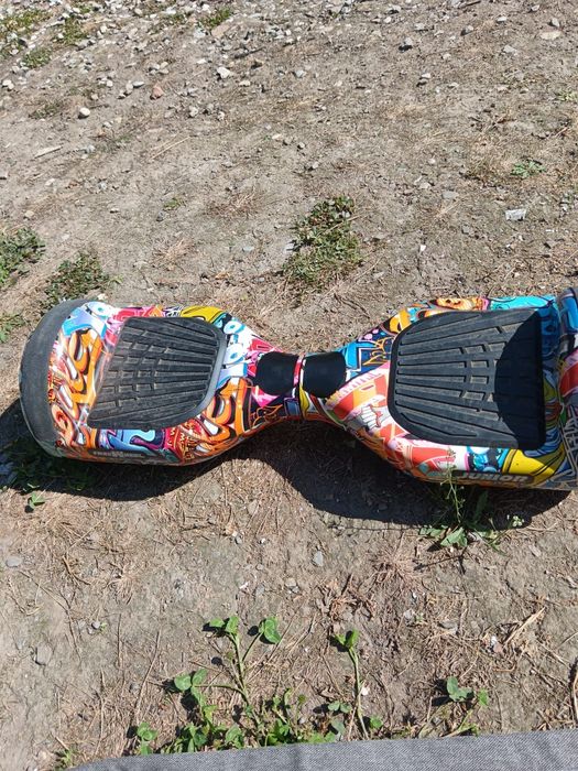 Vând skateboard electric in stare buna de funcționare cu încărcător ,husa .