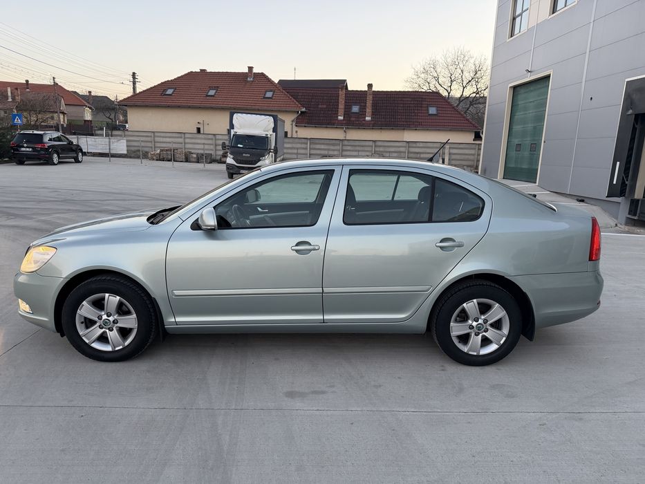 • Skoda Octavia •Model Elegance • 1.4 TSI • 122 CP • An 2011 • Euro 5 • Impecabila •
