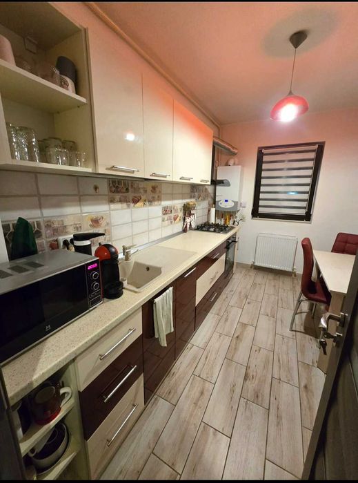 Apartament 2 camere + curte privată 50 mp + loc de parcare proprietate