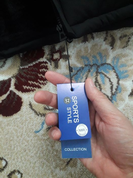 Куртка  новый 52 размер.