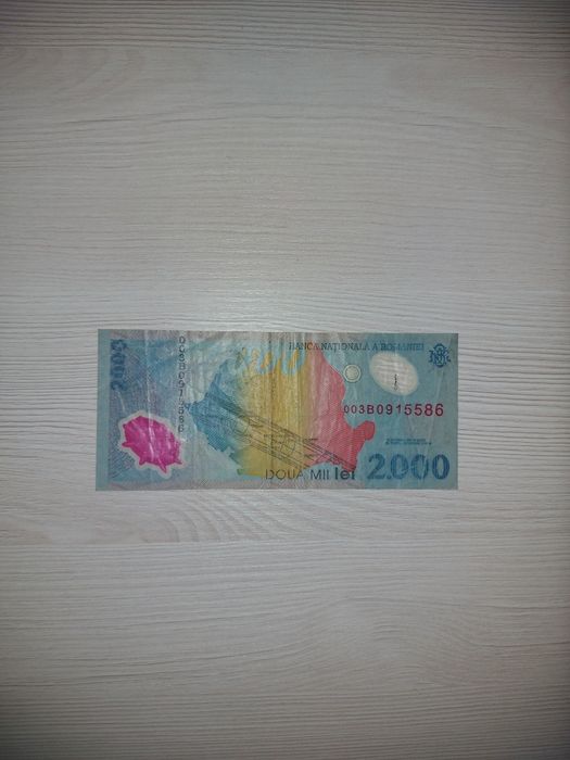 Bancnota 2000 de lei cu eclipsa din 1999
