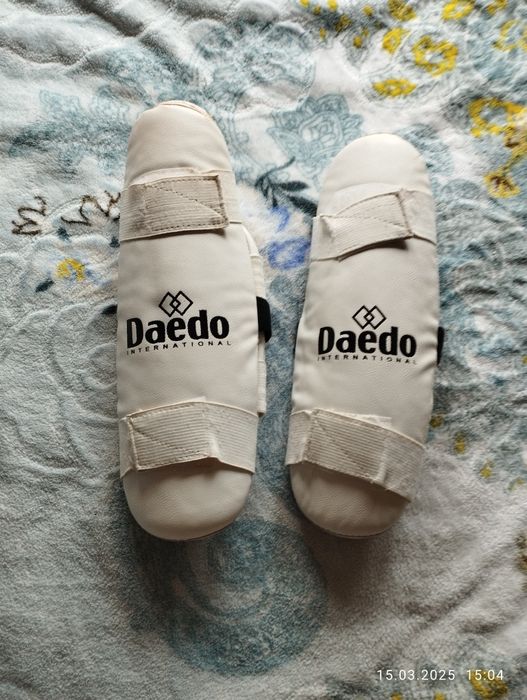 Продаётся кимано и защиту для тэаквандо