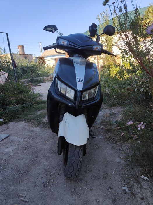 Скутор на ходу сел и поехал