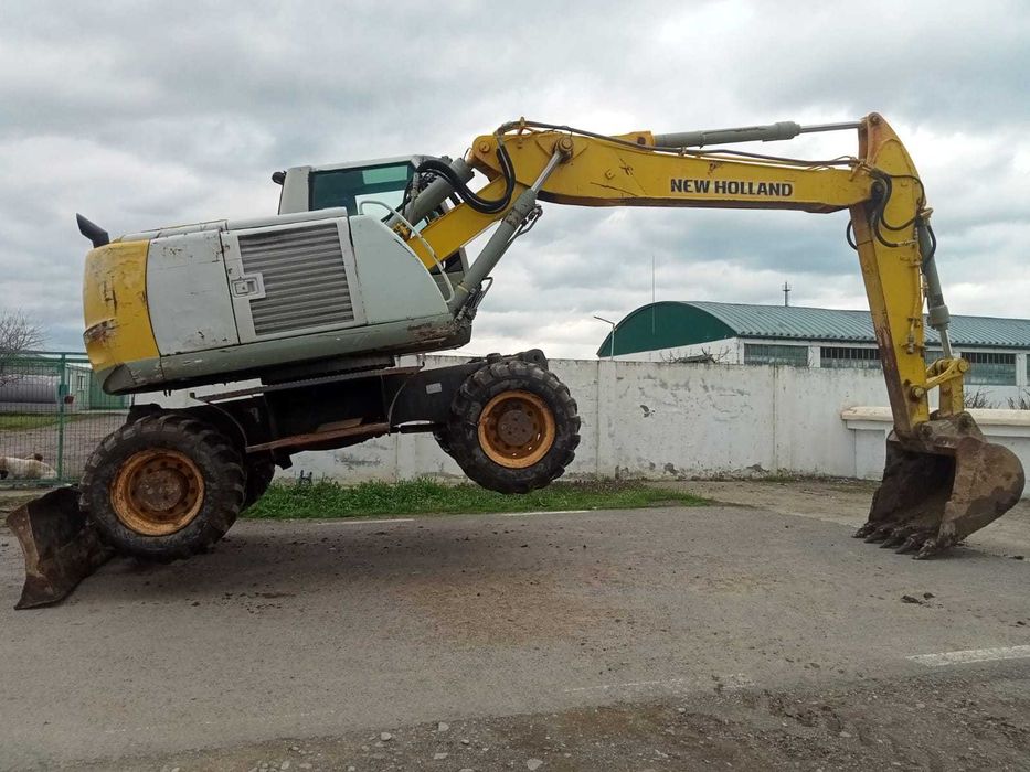 Vand/schimb Excavator New Holand MH City 16t