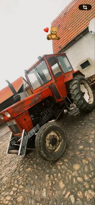 De vânzare sau schimb cu grebla braț stivuitor cu adaptare făcută pentru tractor UTB 650