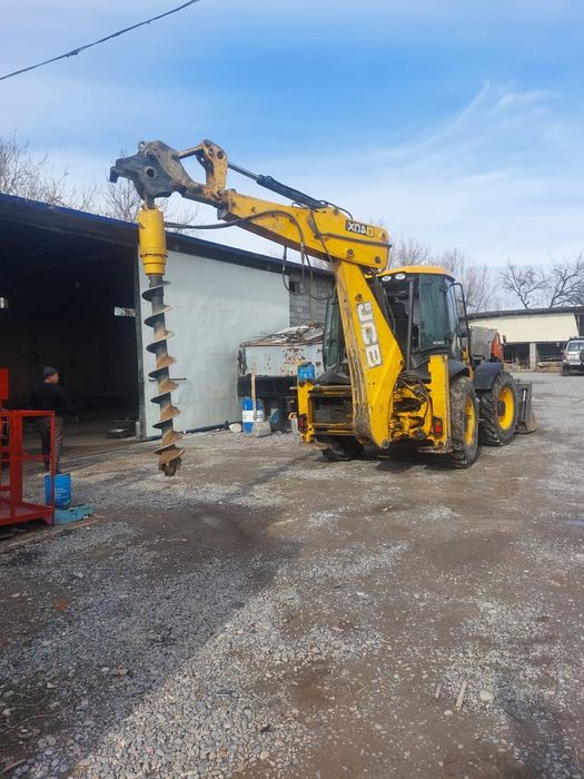 Услуги  экскаватора 3 в 1