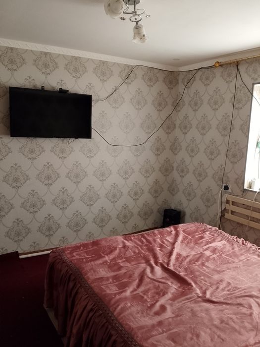 Продаётся дом в городе Чирчик, в бонус авто KIA ориентир Юмалак Хавас