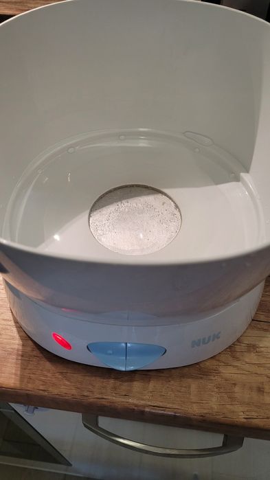 Стерилизатор за бебешки шишета на NUK Vapo 2 в 1