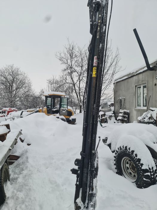 Incarcator/brat în tiranti tractor