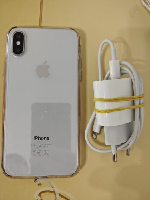 iPhone X cu bateria originală la 100 %