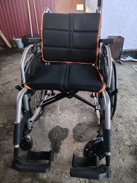 Инвалидная коляска
