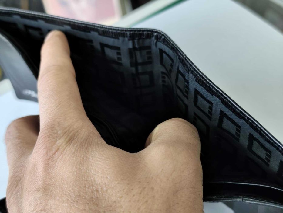 Кожен портфейл S.T. Dupont