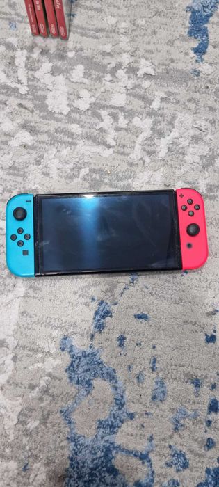 Nintendo Switch OLED + 4 Jocuri Top (Zelda, Mario, Pokemon) - Stare Perfectă