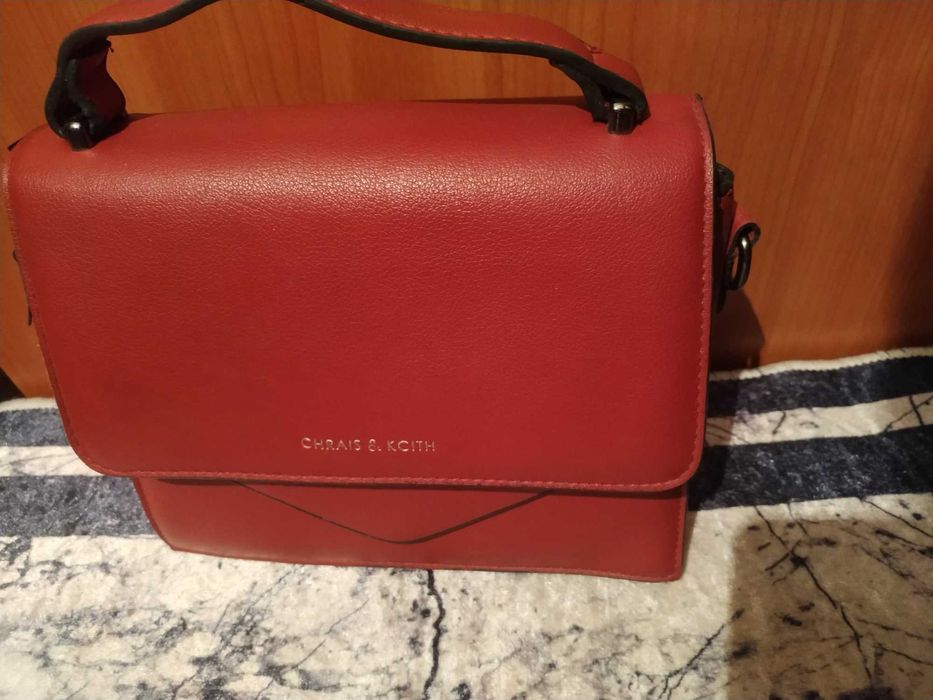 Барсетка из кожи с ремнем