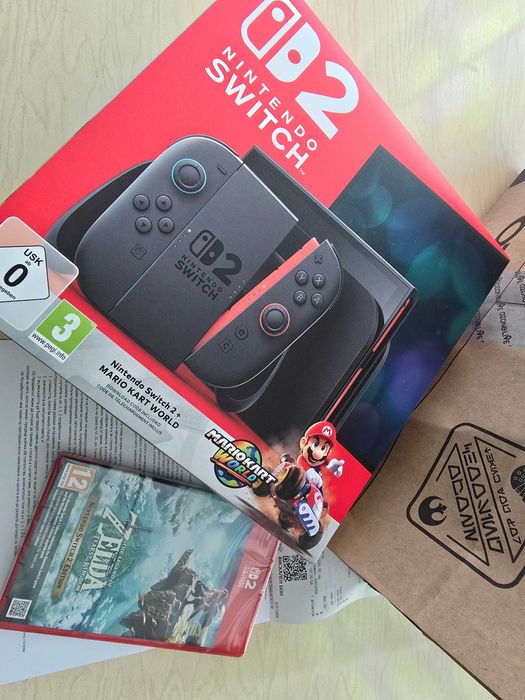 Продавам Nintendo switch 2 с нинтендо про контролер 2 и zelda TOTK