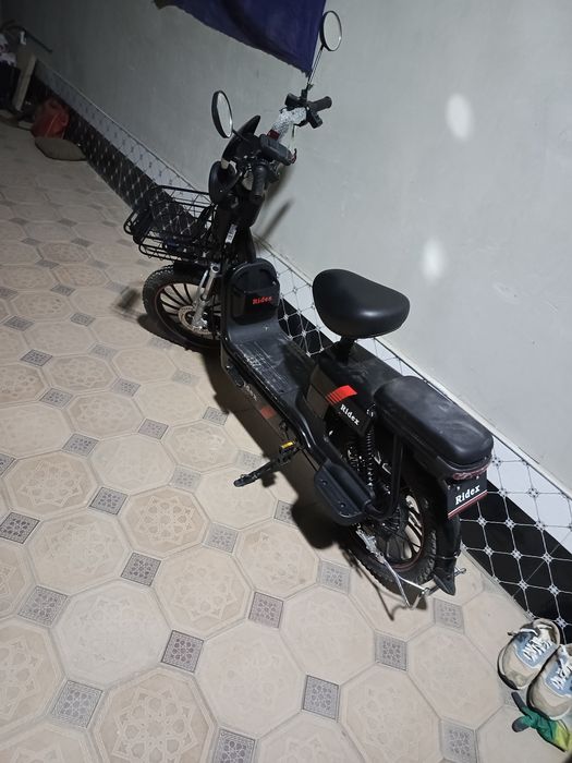 Скутер идеал холатта