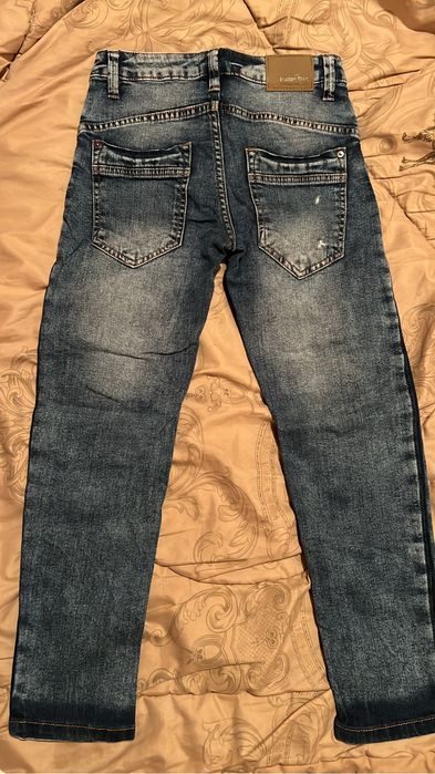 Джинсы бренда «Button blue»