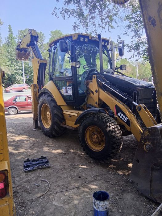 Экскаватор погрузчик Талгар