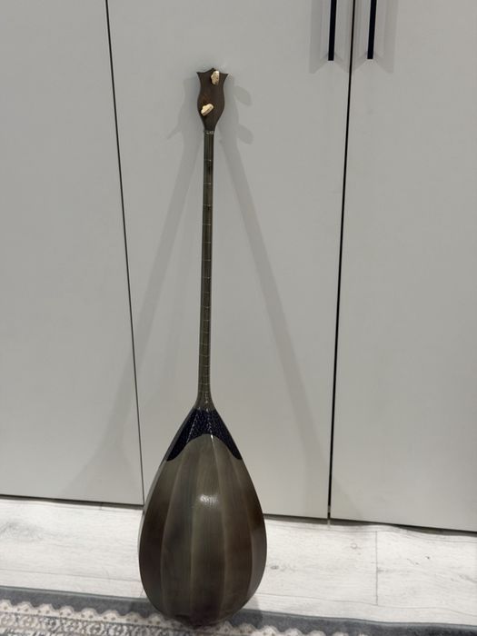 Домбра в хорошем состоянии