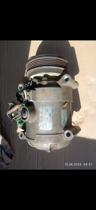 Компрессор кондиционера бмв е34