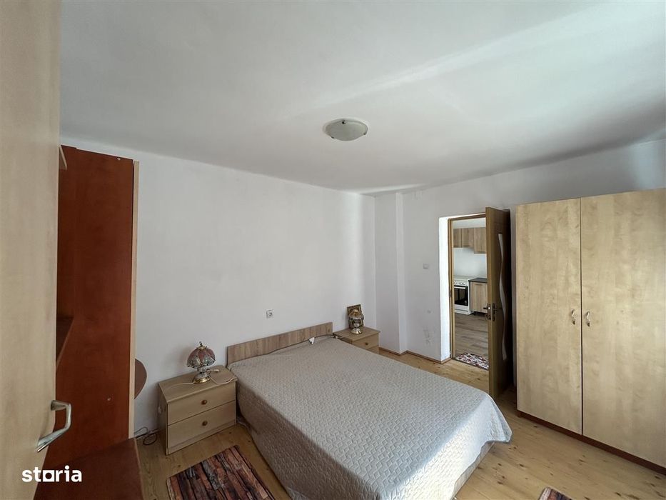 Casa individuala cu 2 corpuri de cladire si teren 625 mp