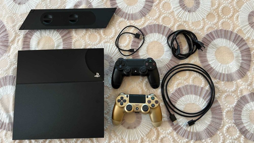 Playstation 4 500gb, 2 джойстика, вертикална стойка и игри на дискове ...