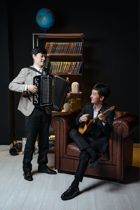 Домбыра баян музыкант