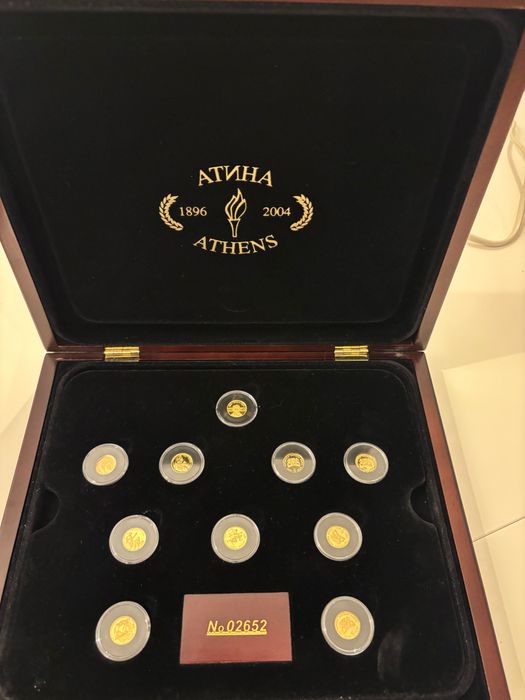 Златни монети Атина олимпиада
