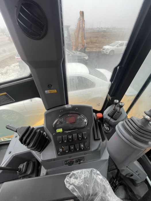 Экскаватор погрузчик Rigor