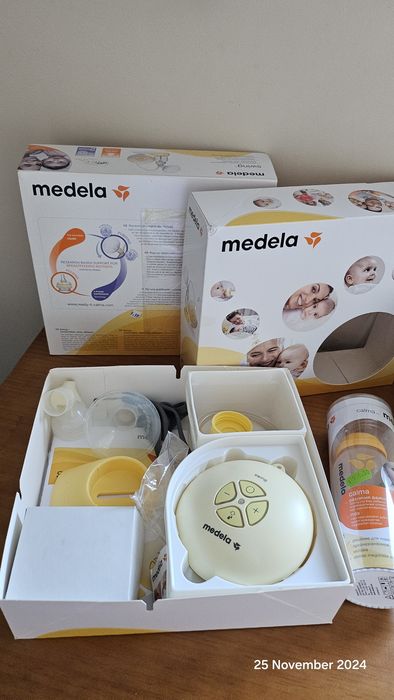 Pompă electrică Medela + biberoane