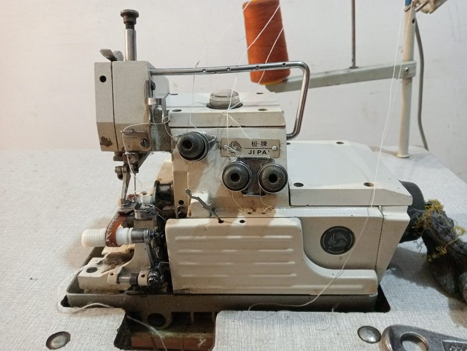 Швейный сторон Оверлок