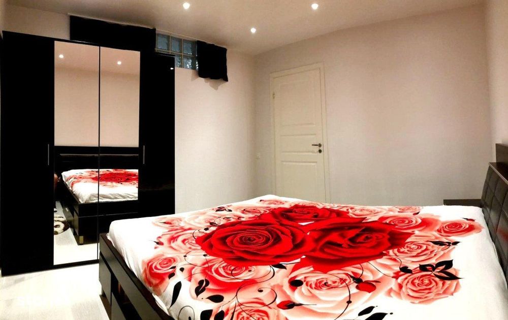 Apartament cu 2 dormitoare, gradina, bucatarie cu dining parcare, zona