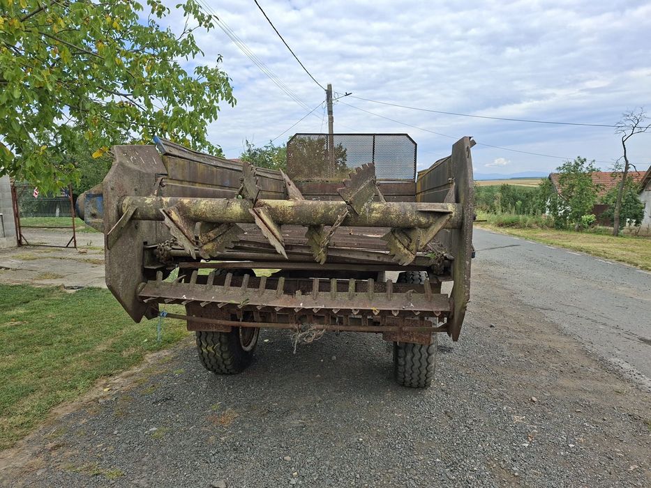 Mig de împrăștiat gunoi