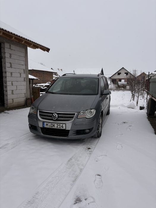 Vand  Volkswagen Touran 7 locuri automat