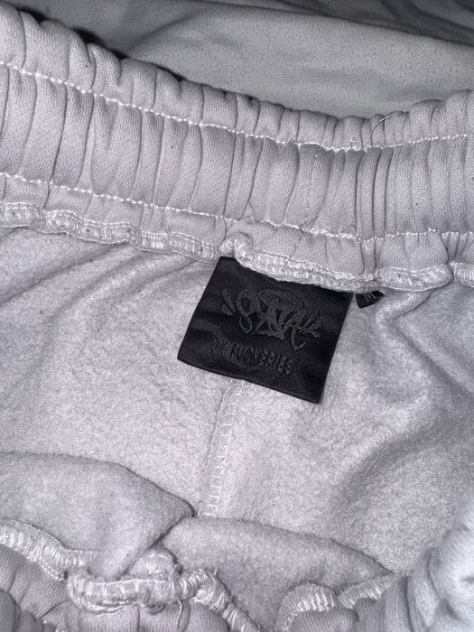 Pantaloni syna world