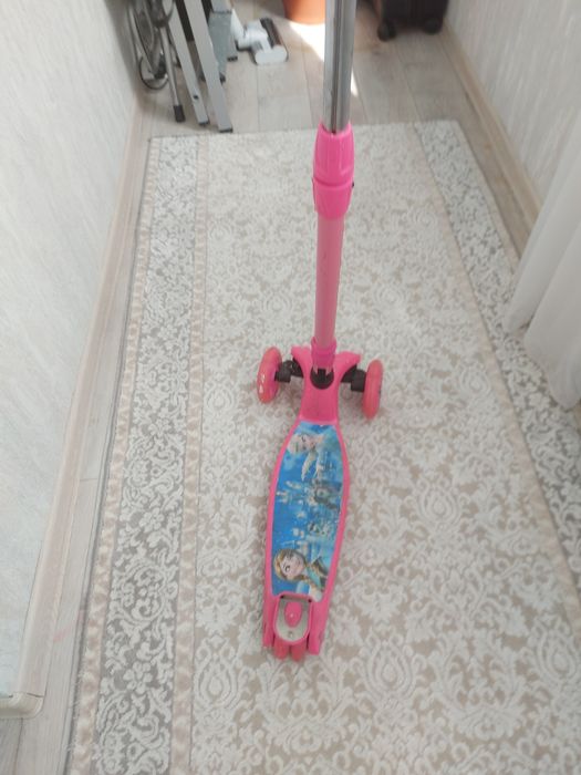 Самокат для девочки до 7 лет
