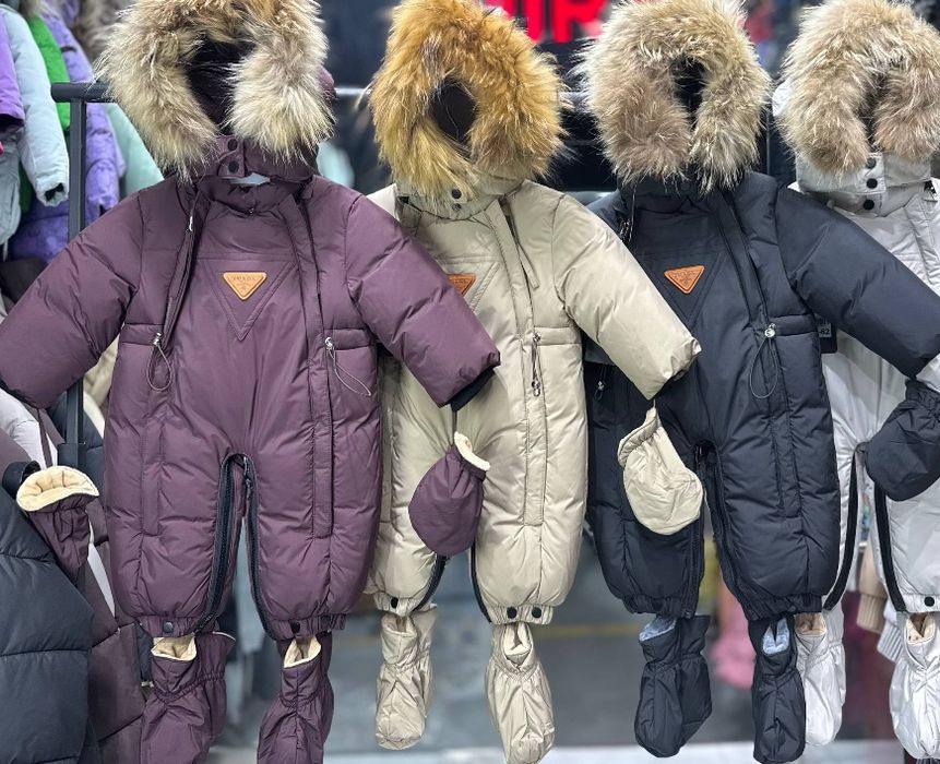 Продам новые  зимние комбинезоны.