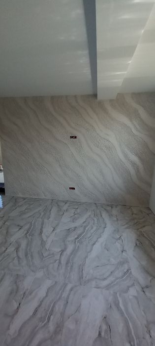 Efectuam tencuiala decorativă cu efect de travertin