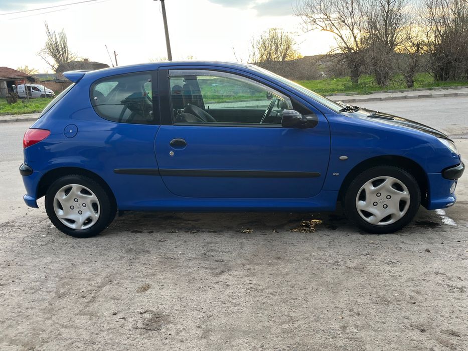 Peugeot  206 1.4 75 коня
