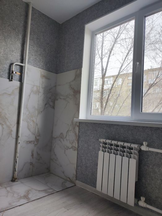 Продам 4 комнатную квартиру