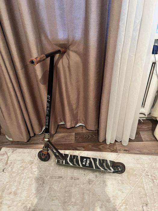 Трюковой самокат