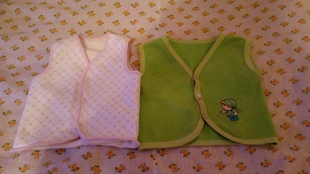 Теплые кофточки и жилеты для девочки до года.