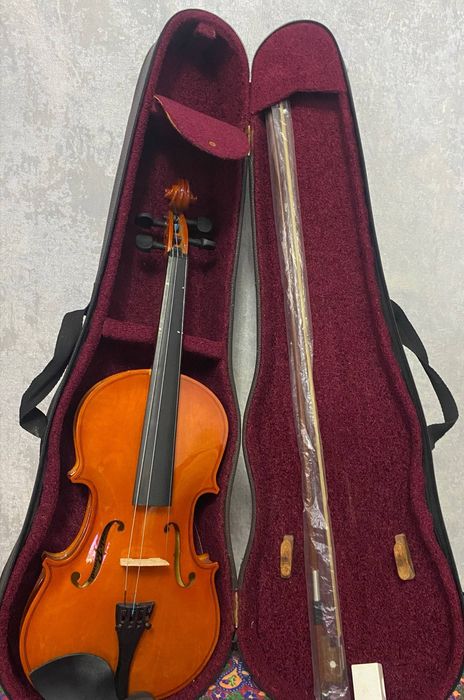 Скрипка янги ишлатилмаган