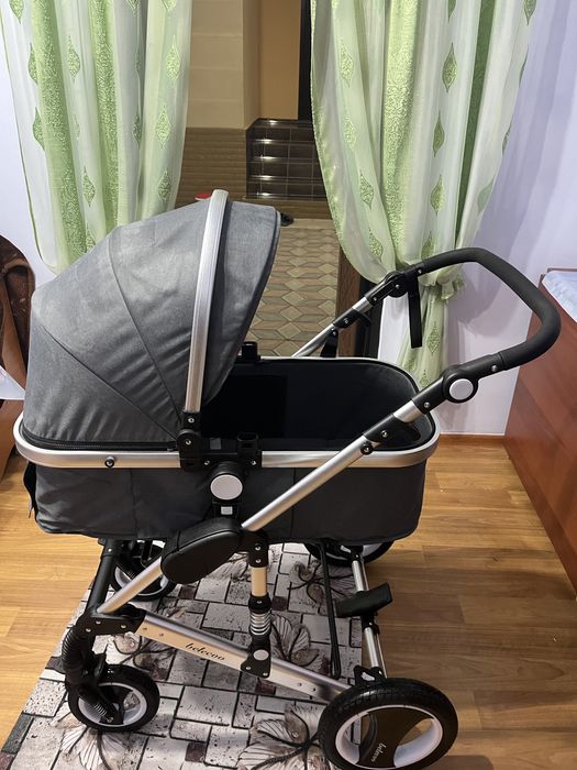 Коляска в сером цвете