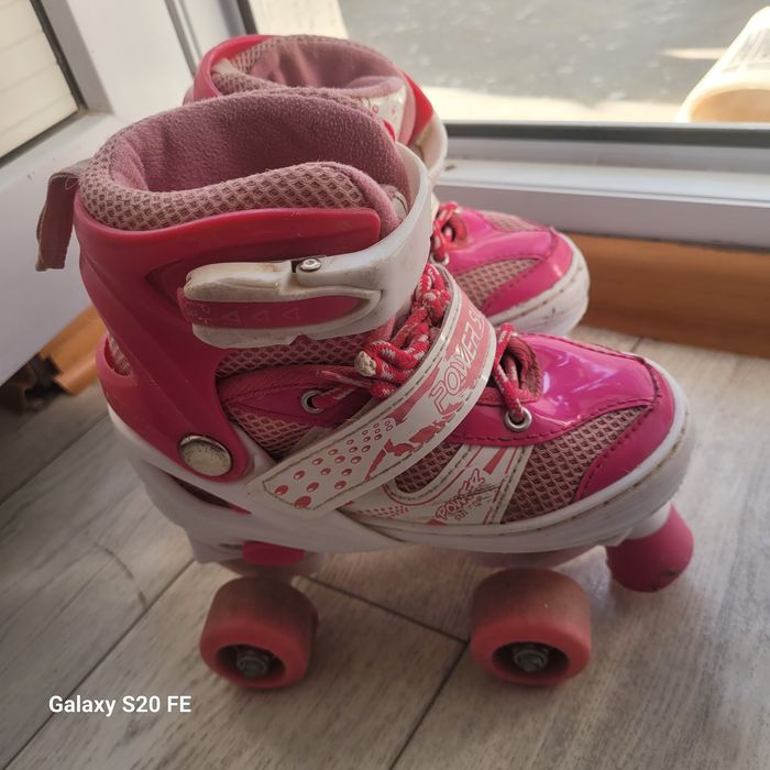 Роликовый коньки